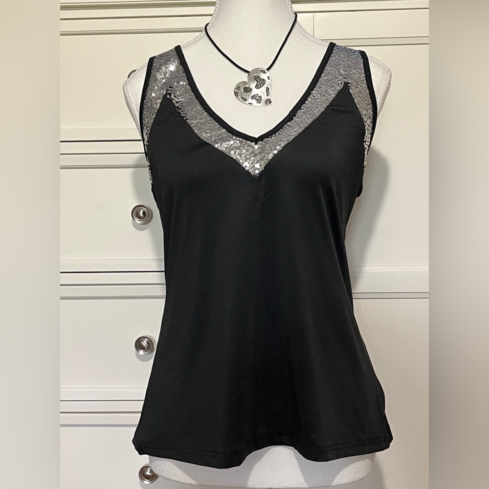Black dressy v-neck blouse with sequins. Size L